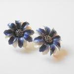 blue and white flower earri..